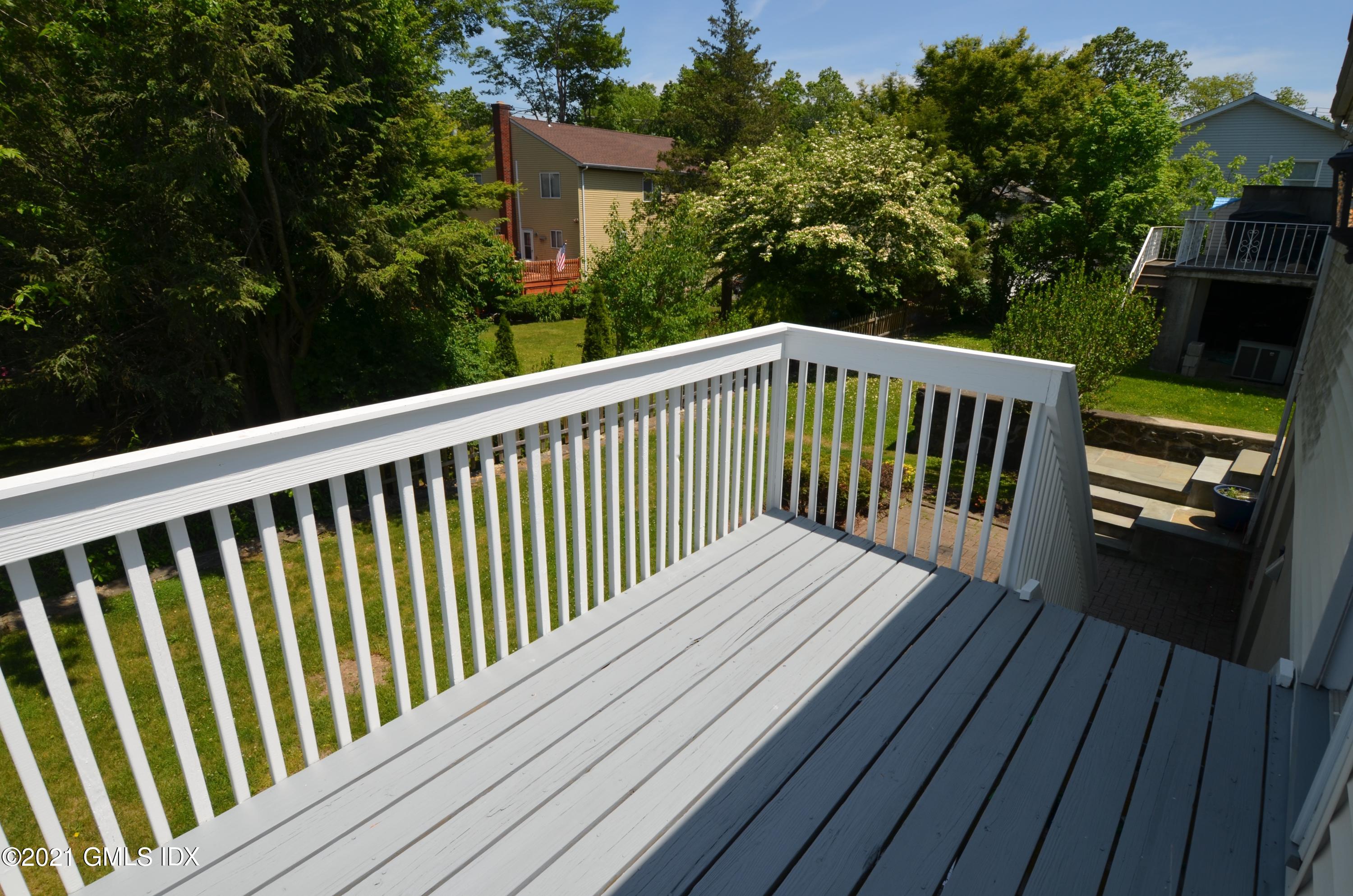 5 Ridge Place, Unit 1 Greenwich, CT 06831 - Photo 24 of 29 a view of balcony with wooden floor