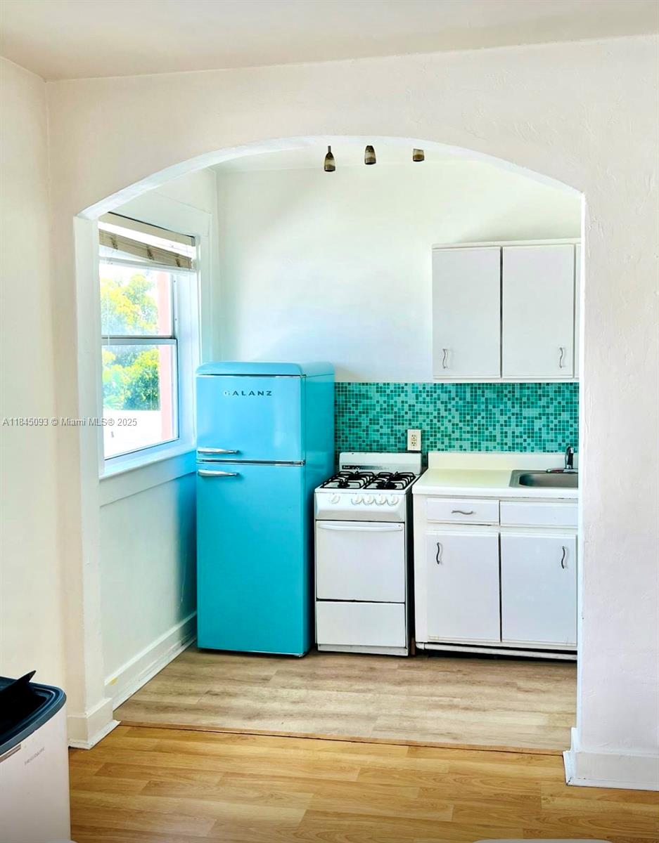 642 Michigan Avenue, Unit 24 Miami Beach, FL 33139 - Photo 2 of 5 a view of a room with storage and utility