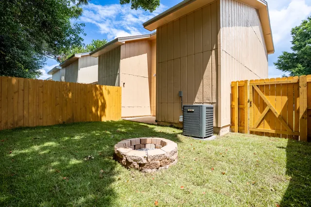 a view of backyard with green space