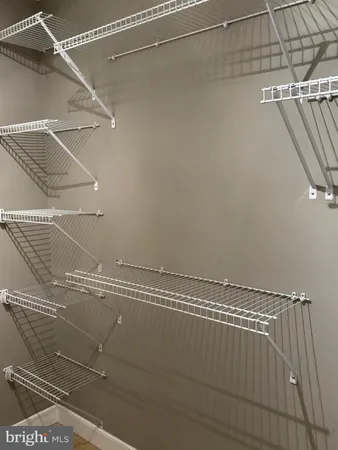 a view of a room with racks on the wall