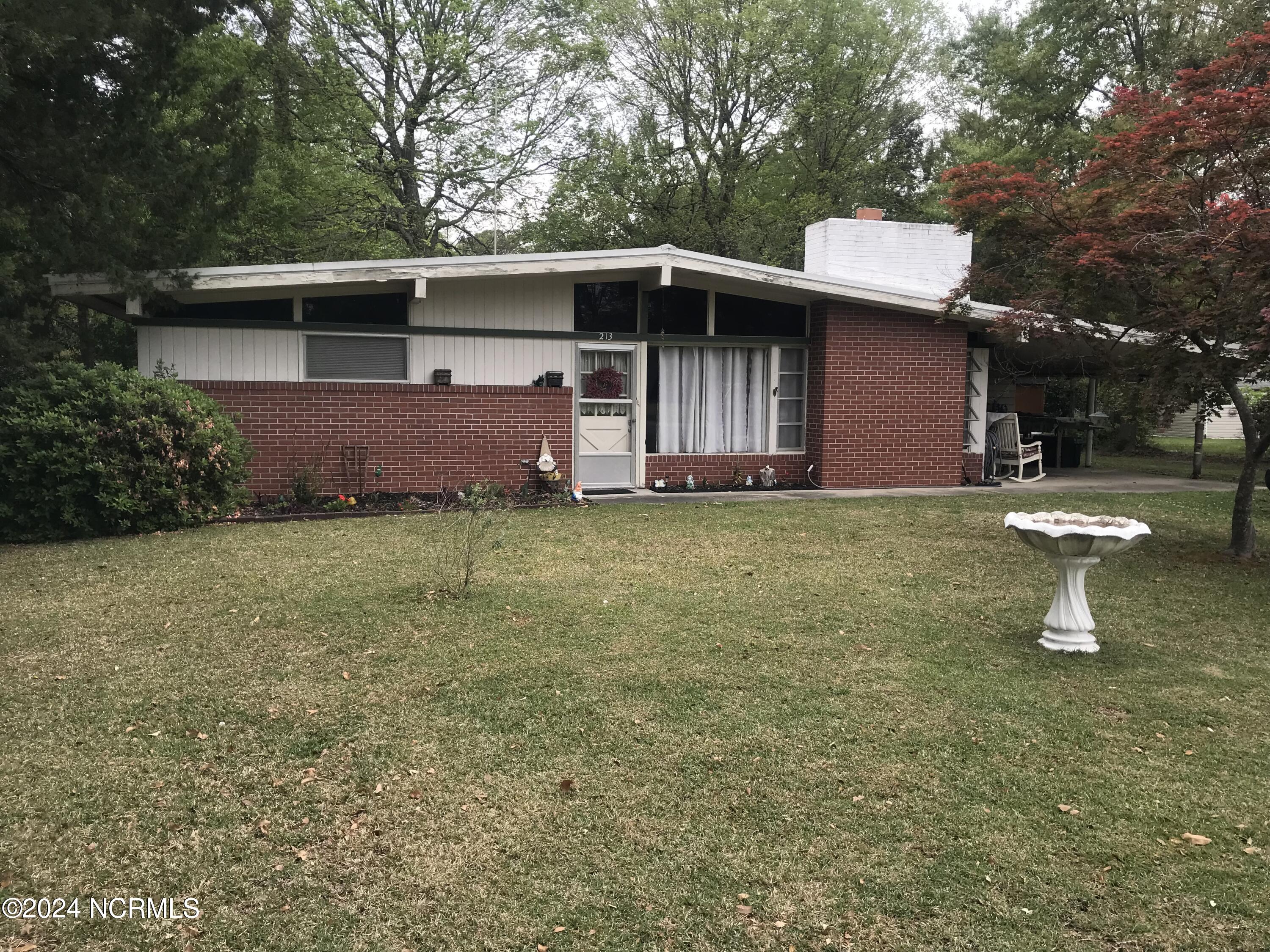 213 East Ridge Street Rose Hill, NC 28458 - Photo 1 of 11 Front