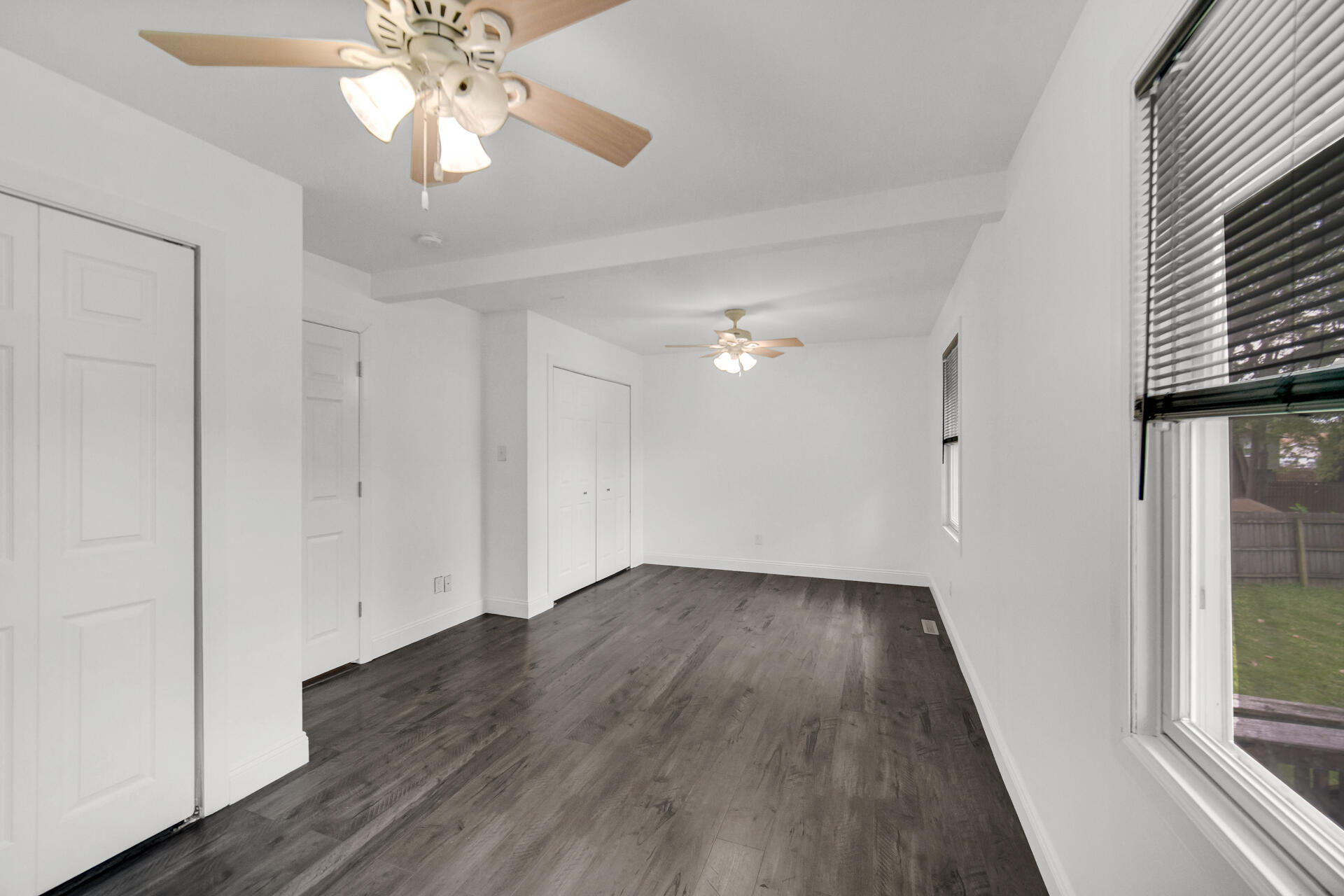 3716 Walsh Street Portage, IN 46368 - Photo 11 of 24 wooden floor in an empty room with a window