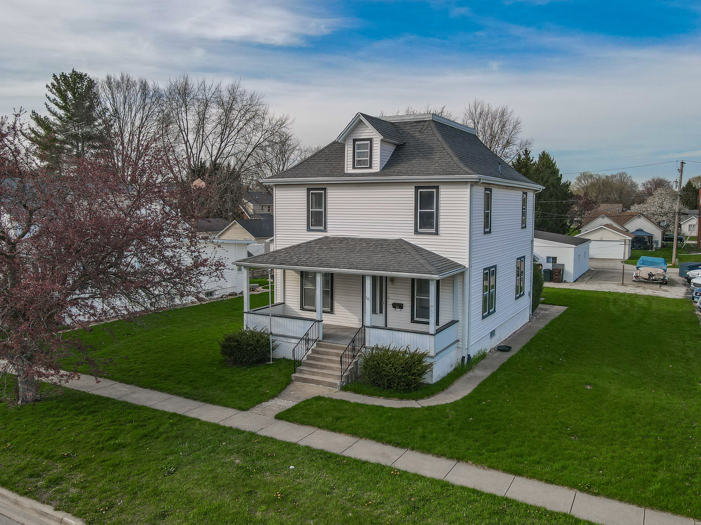 141 West 1st Street Manteno, IL 60950 - Photo 1 of 16 a front view of a house with a yard