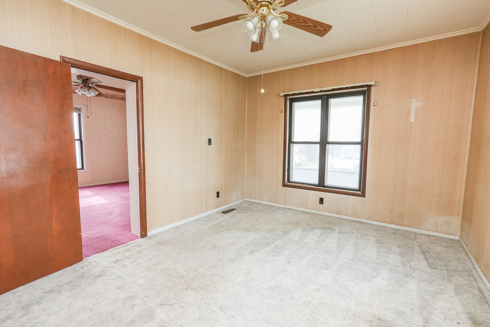 141 West 1st Street Manteno, IL 60950 - Photo 8 of 16 a view of an empty room with a window