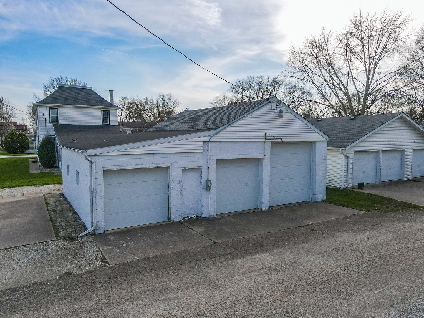 141 West 1st Street Manteno, IL 60950 - Photo 11 of 16 a front view of a house with a yard and garage