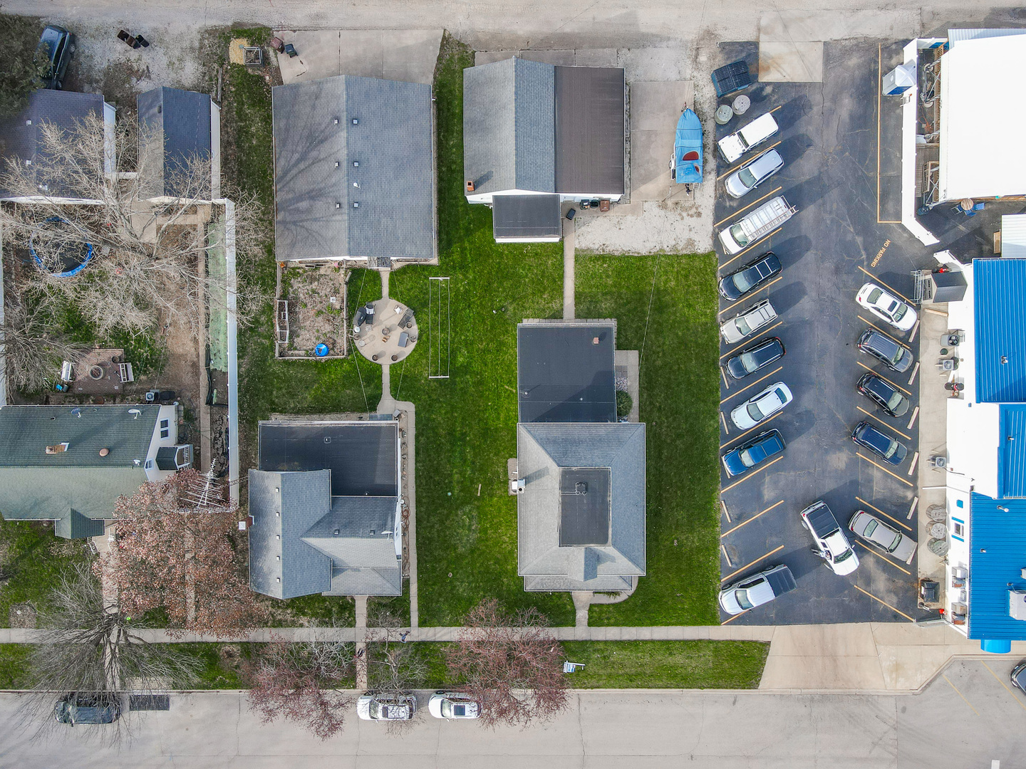 141 West 1st Street Manteno, IL 60950 - Photo 14 of 16 a aerial view of a house with a garden and plants