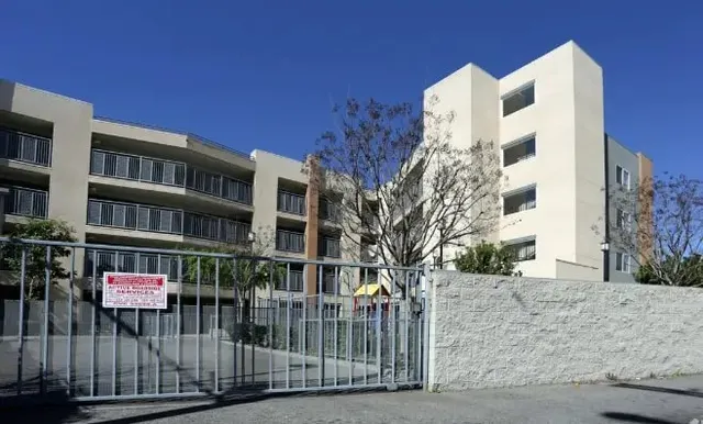 a view of buildings with a outdoor space