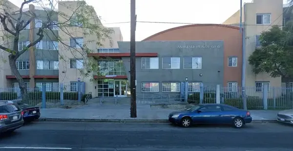 a car parked in front of a building