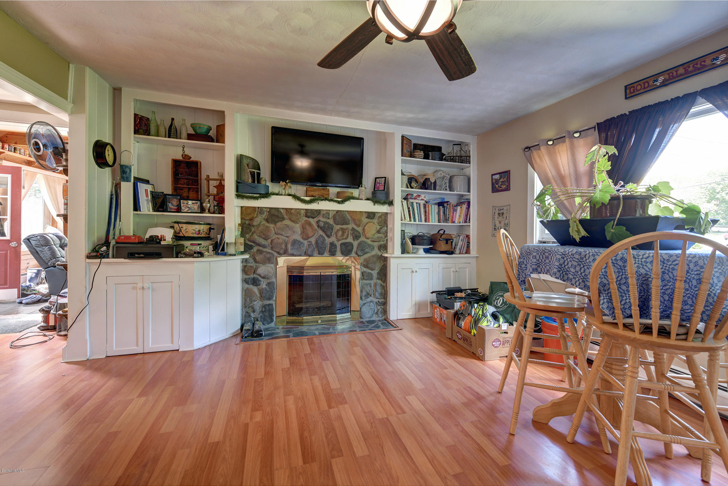 2175 Swamp Road Richmond, MA 01254 - Photo 14 of 33 a living room with furniture fireplace and flat screen tv
