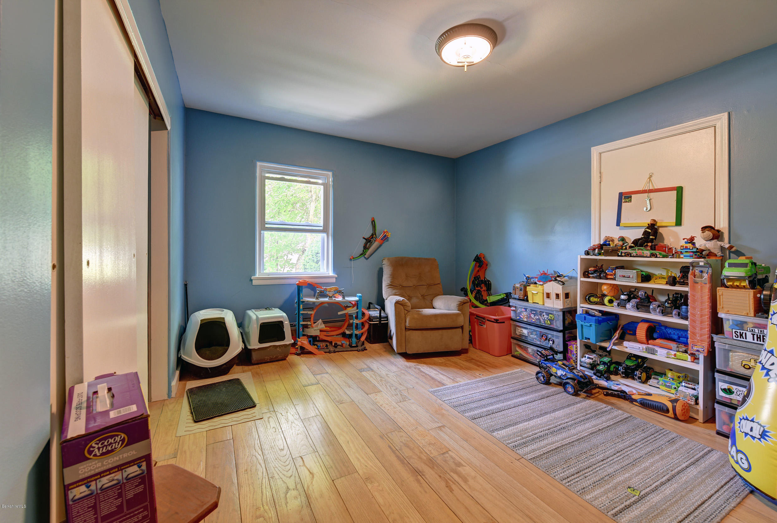 2175 Swamp Road Richmond, MA 01254 - Photo 16 of 33 a living room with lots of furniture and a wooden floor