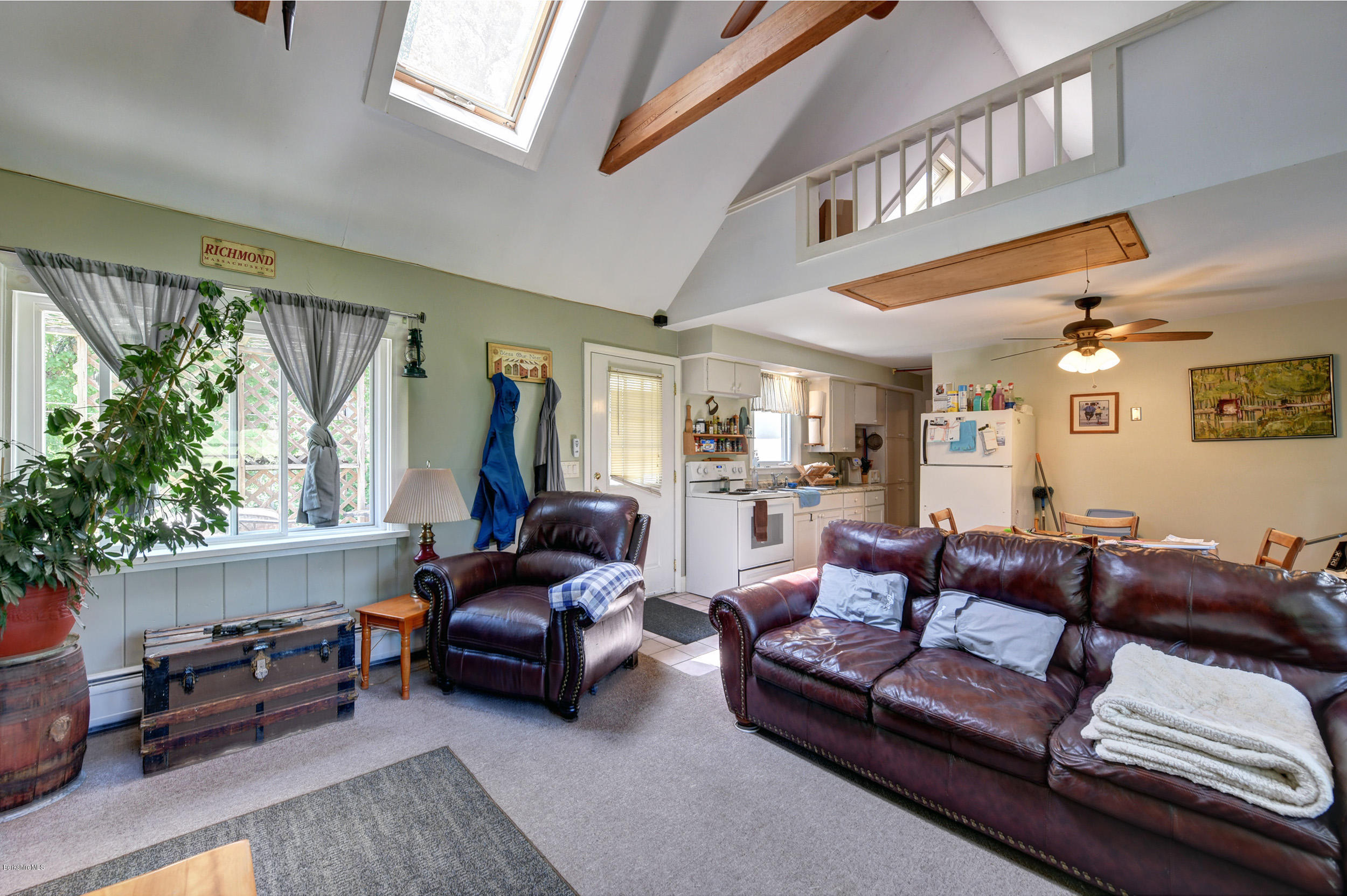 2175 Swamp Road Richmond, MA 01254 - Photo 19 of 33 a living room with furniture and a large window