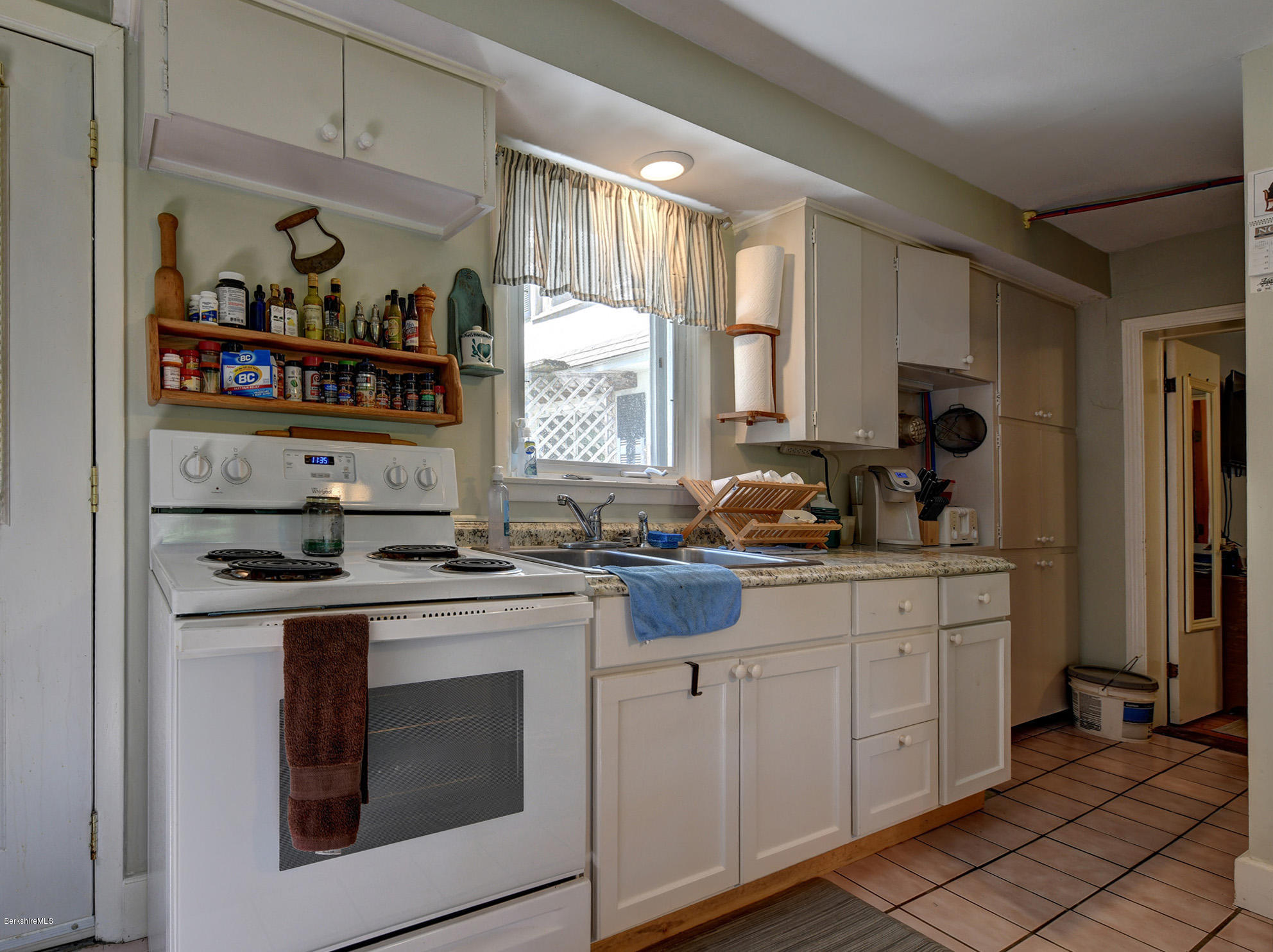 2175 Swamp Road Richmond, MA 01254 - Photo 20 of 33 a kitchen with stainless steel appliances granite countertop a stove and cabinets
