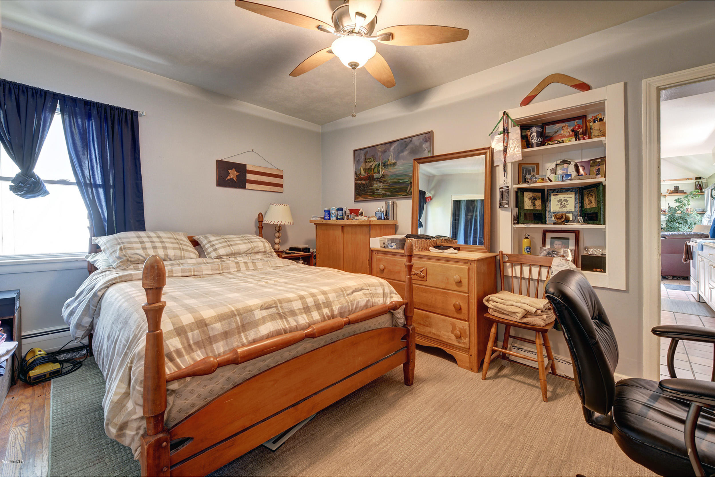 2175 Swamp Road Richmond, MA 01254 - Photo 21 of 33 a bedroom with a bed and a chandelier