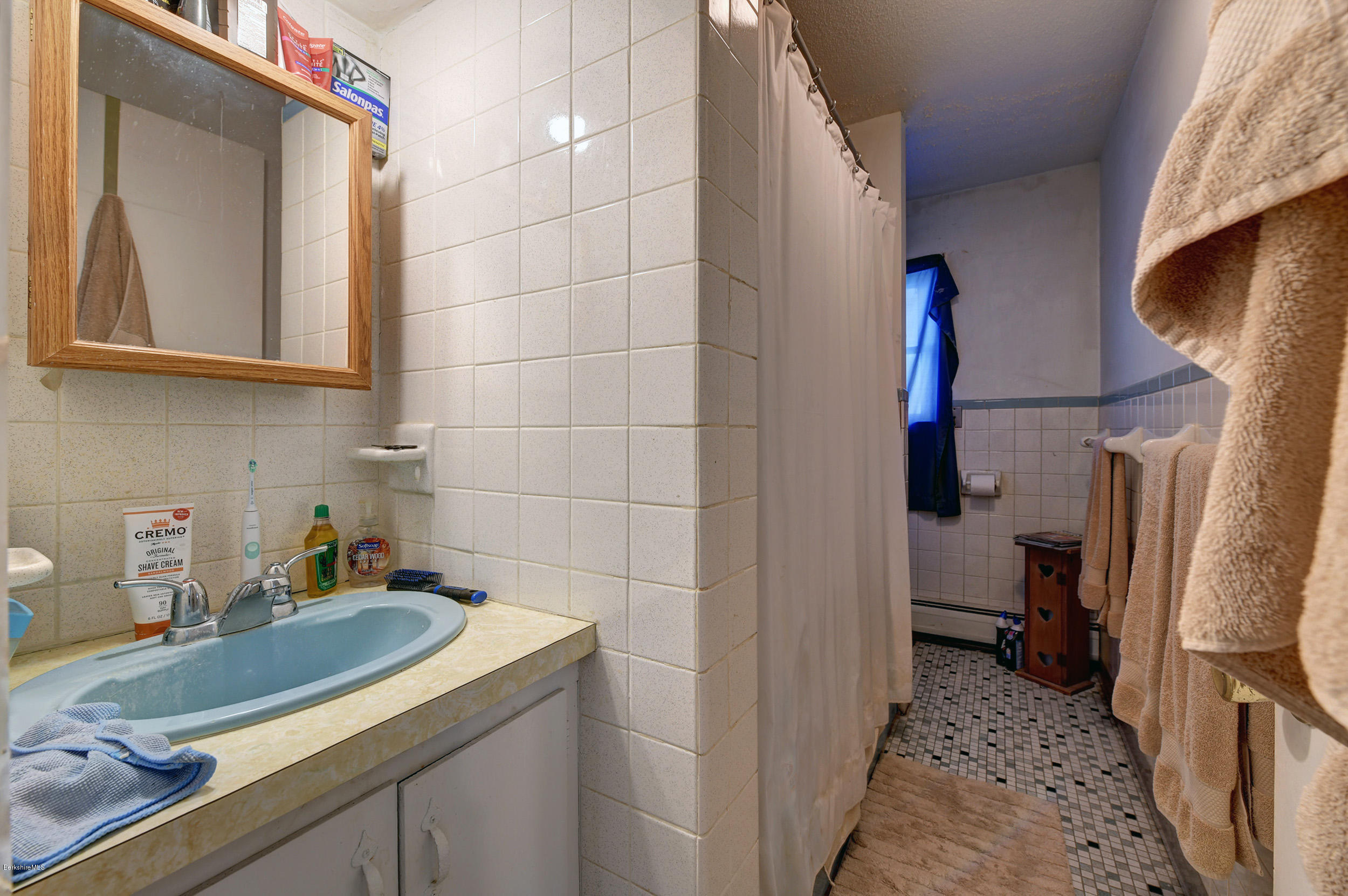 2175 Swamp Road Richmond, MA 01254 - Photo 22 of 33 a bathroom with a sink and a mirror
