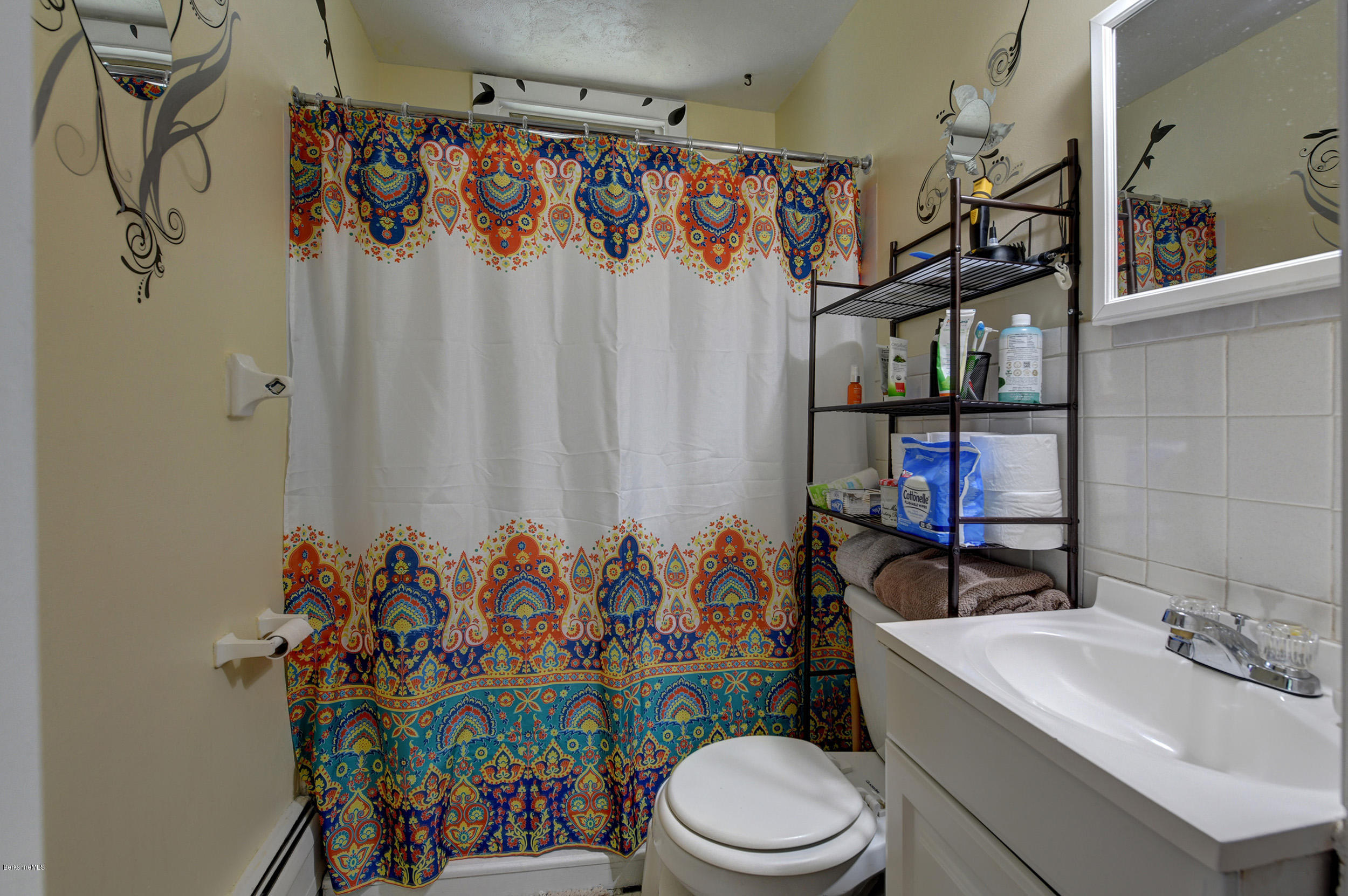 2175 Swamp Road Richmond, MA 01254 - Photo 25 of 33 a bathroom with a toilet sink and mirror