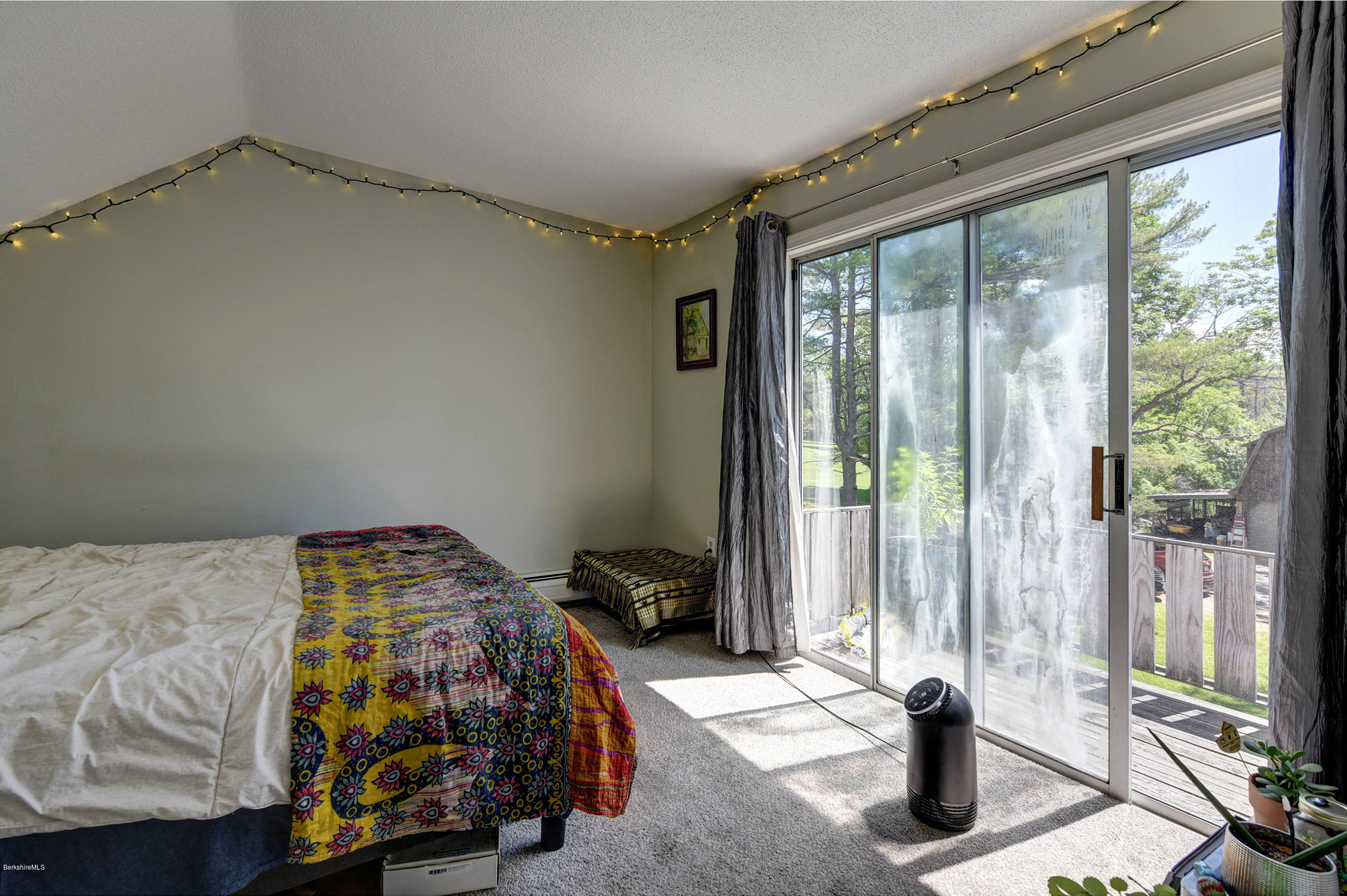 2175 Swamp Road Richmond, MA 01254 - Photo 27 of 33 a bedroom with a bed and a window