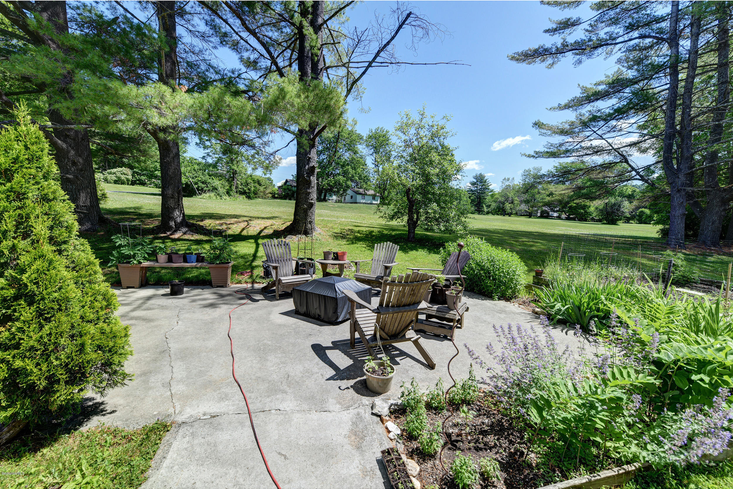 2175 Swamp Road Richmond, MA 01254 - Photo 29 of 33 a view of a patio with chairs and plants