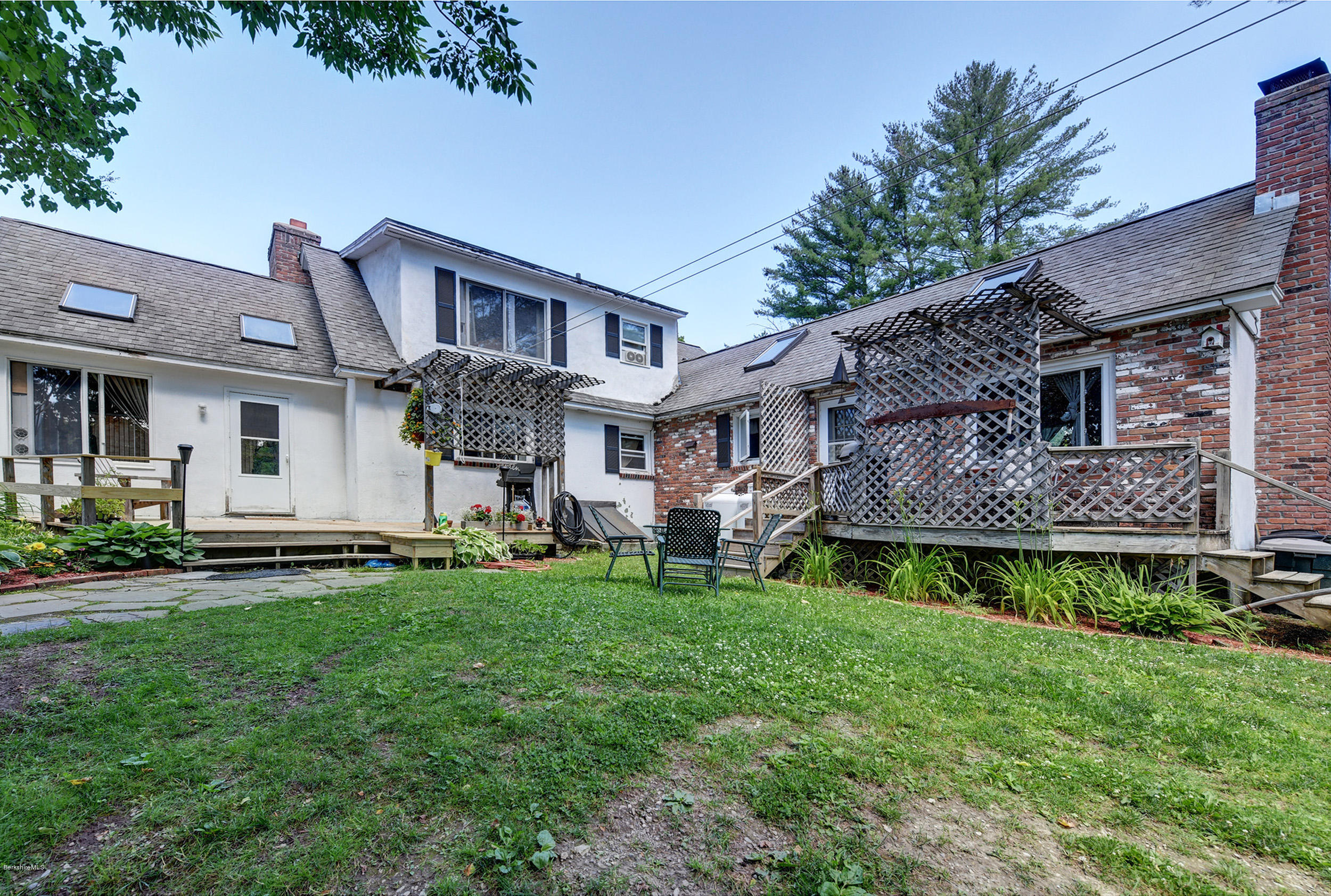 2175 Swamp Road Richmond, MA 01254 - Photo 30 of 33 a front view of a house with a garden