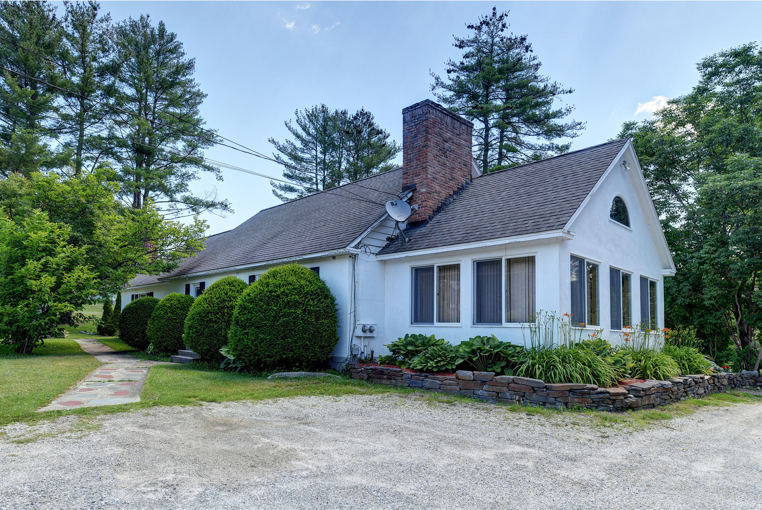2175 Swamp Road Richmond, MA 01254 - Photo 33 of 33 a front view of a house with garden