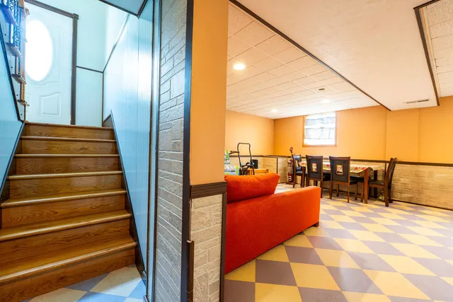 a view of entryway and hall with dining room
