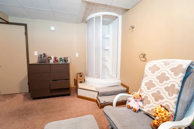 a room with furniture and a rug