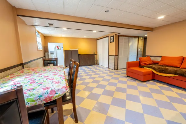 a bathroom with a sink toilet and a mirror