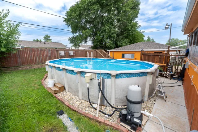 a view of backyard with green space