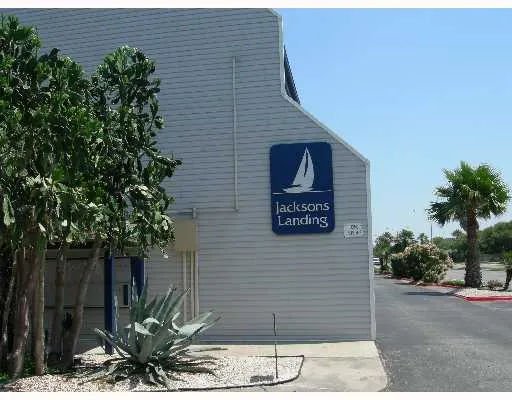 a sign that is on the side of a building