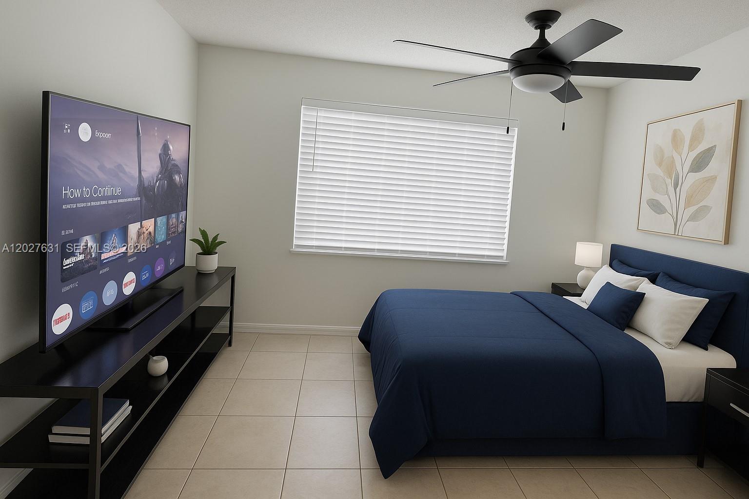 2081 Renaissance Boulevard, Unit 306 Miramar, FL 33025 - Photo 6 of 22 a bedroom with a bed and a window