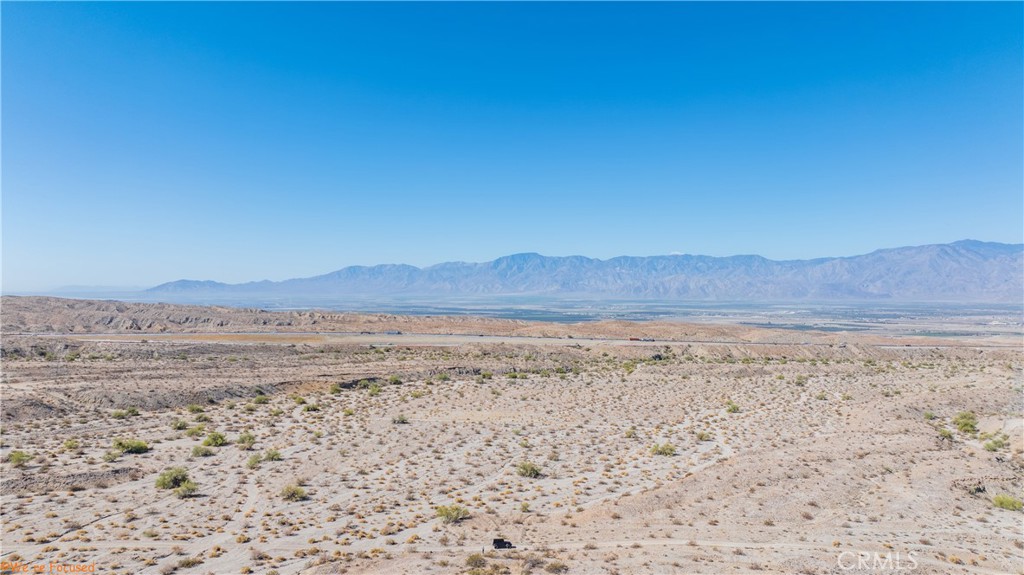 a view of ocean and mountain