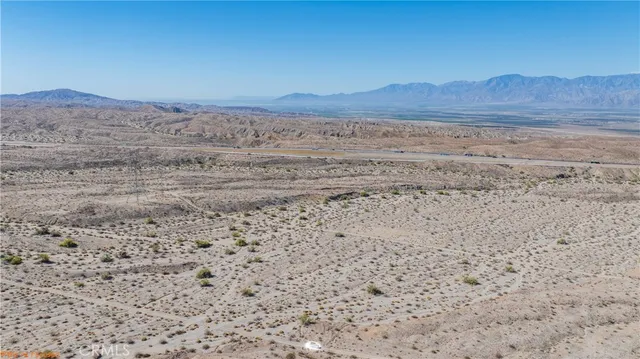 a view of ocean and mountain