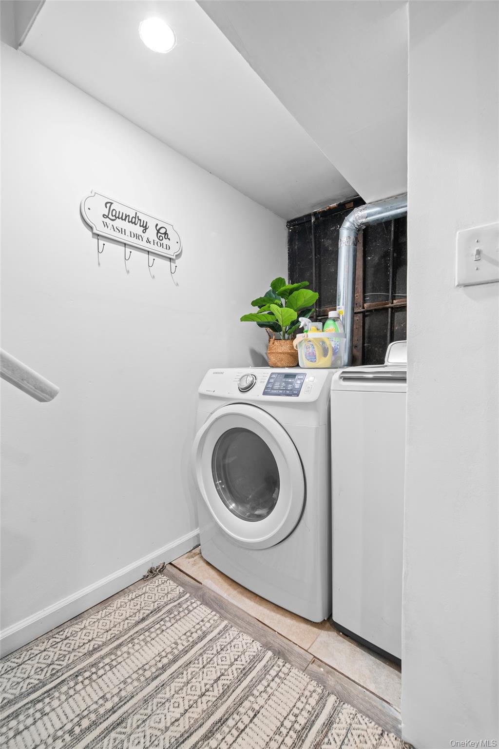 113-34 Springfield Boulevard Queens, NY 11429 - Photo 15 of 26 a utility room with dryer and washer