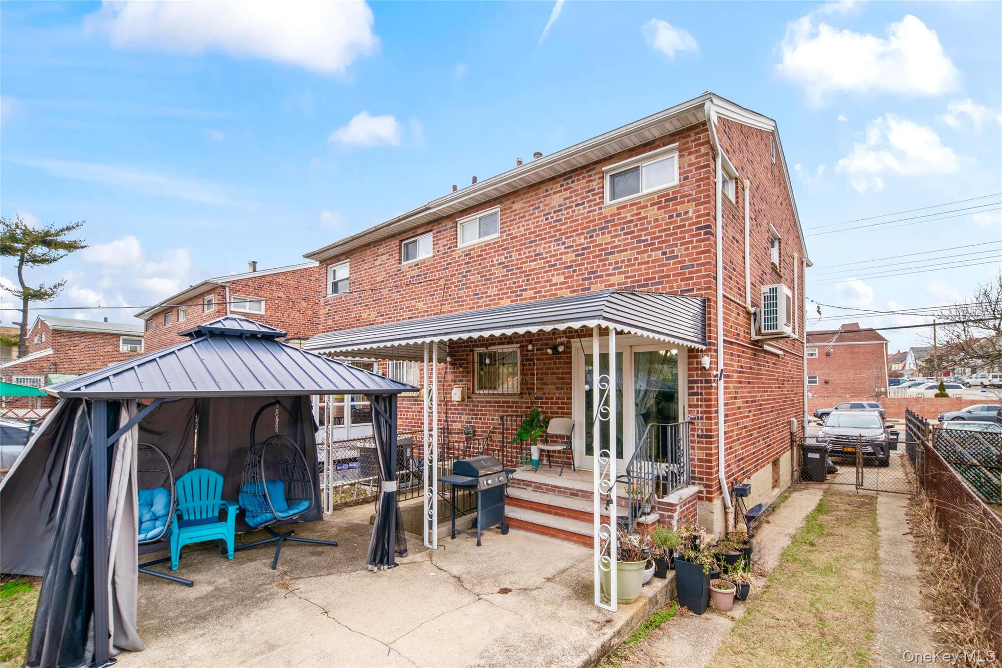 113-34 Springfield Boulevard Queens, NY 11429 - Photo 18 of 26 a front view of a house