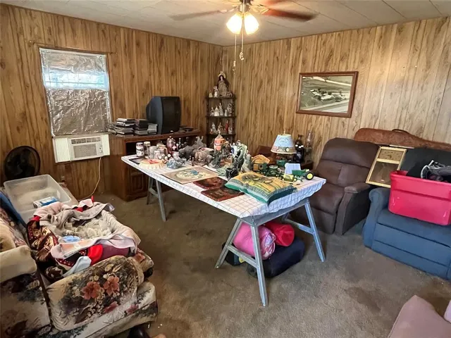 a room with furniture and a window