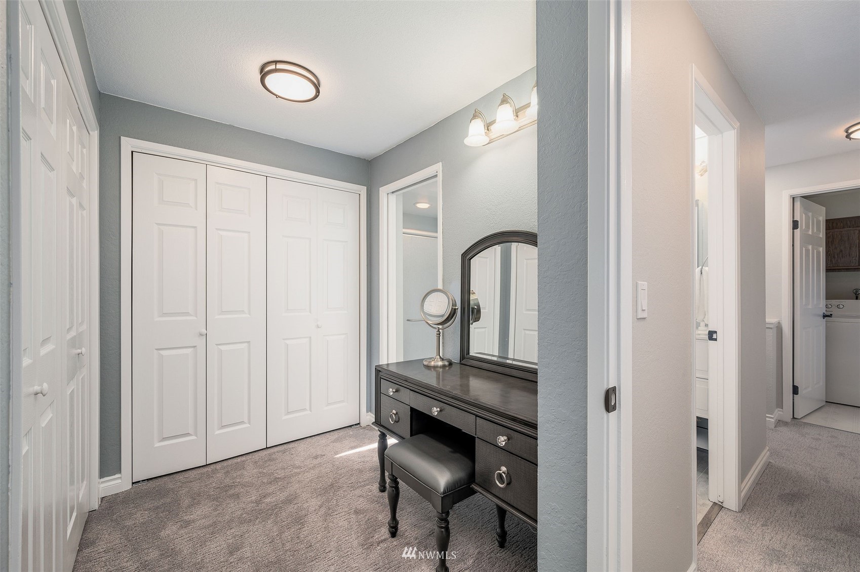 1603 Eagle Ridge Drive South, Unit D4 Renton, WA 98055 - Photo 23 of 30 a view of a hallway with workspace