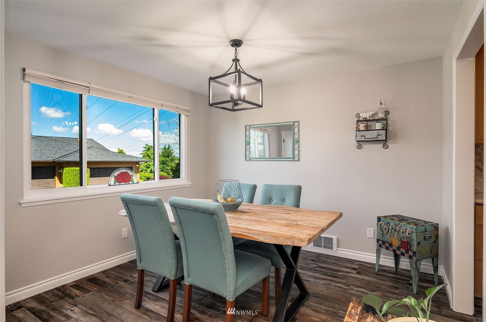 1603 Eagle Ridge Drive South, Unit D4 Renton, WA 98055 - Photo 6 of 30 a view of a dining room with furniture window and outside view