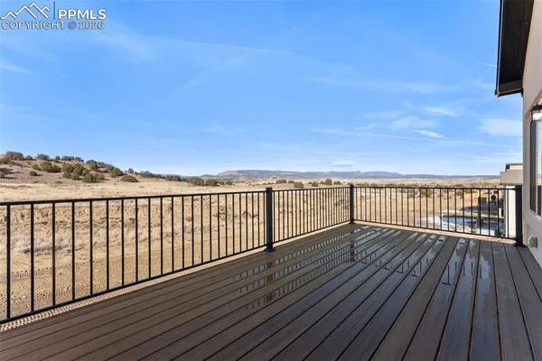 a view of wooden floor with a city view