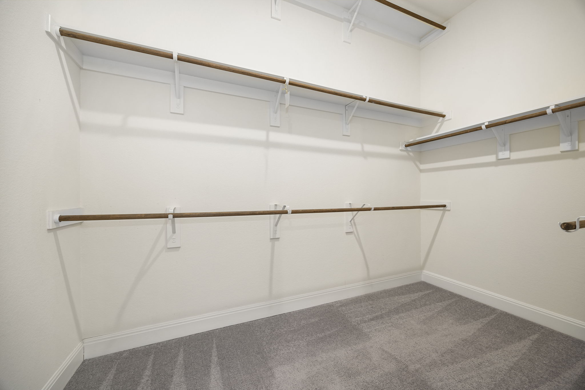 1098 Cherrystone Loop Buda, TX 78610 - Photo 19 of 37 a view of an empty walk in closet