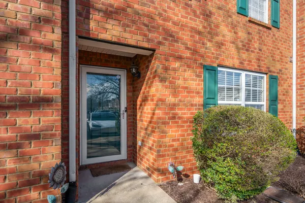 a car parked in front of a house