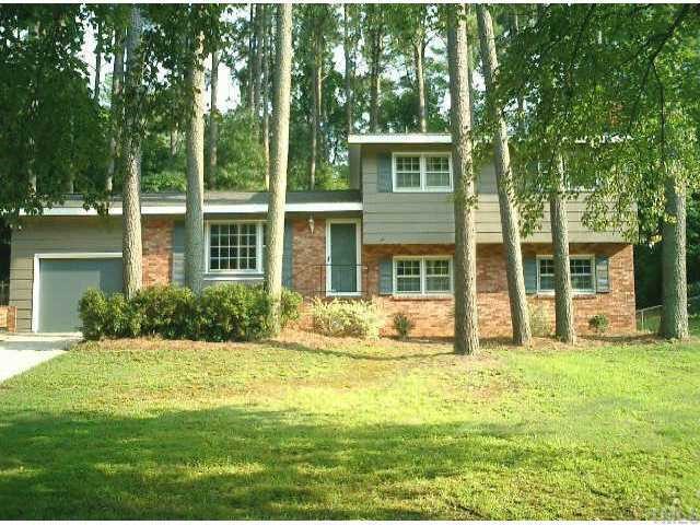 a house view with a garden space