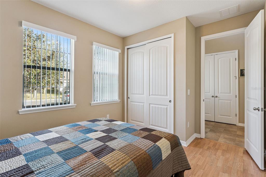 13232 Longacre Drive Windermere, FL 34786 - Photo 11 of 28 a bedroom with a bed and a window