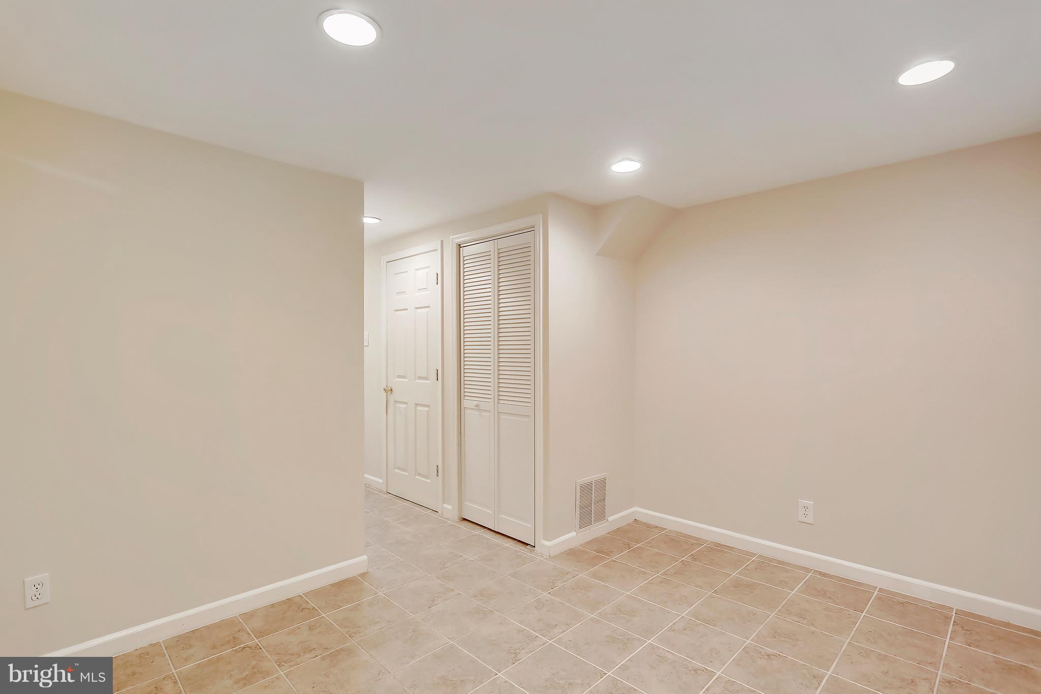 10740 Lester Street Silver Spring, MD 20902 - Photo 14 of 30 a view of an empty room
