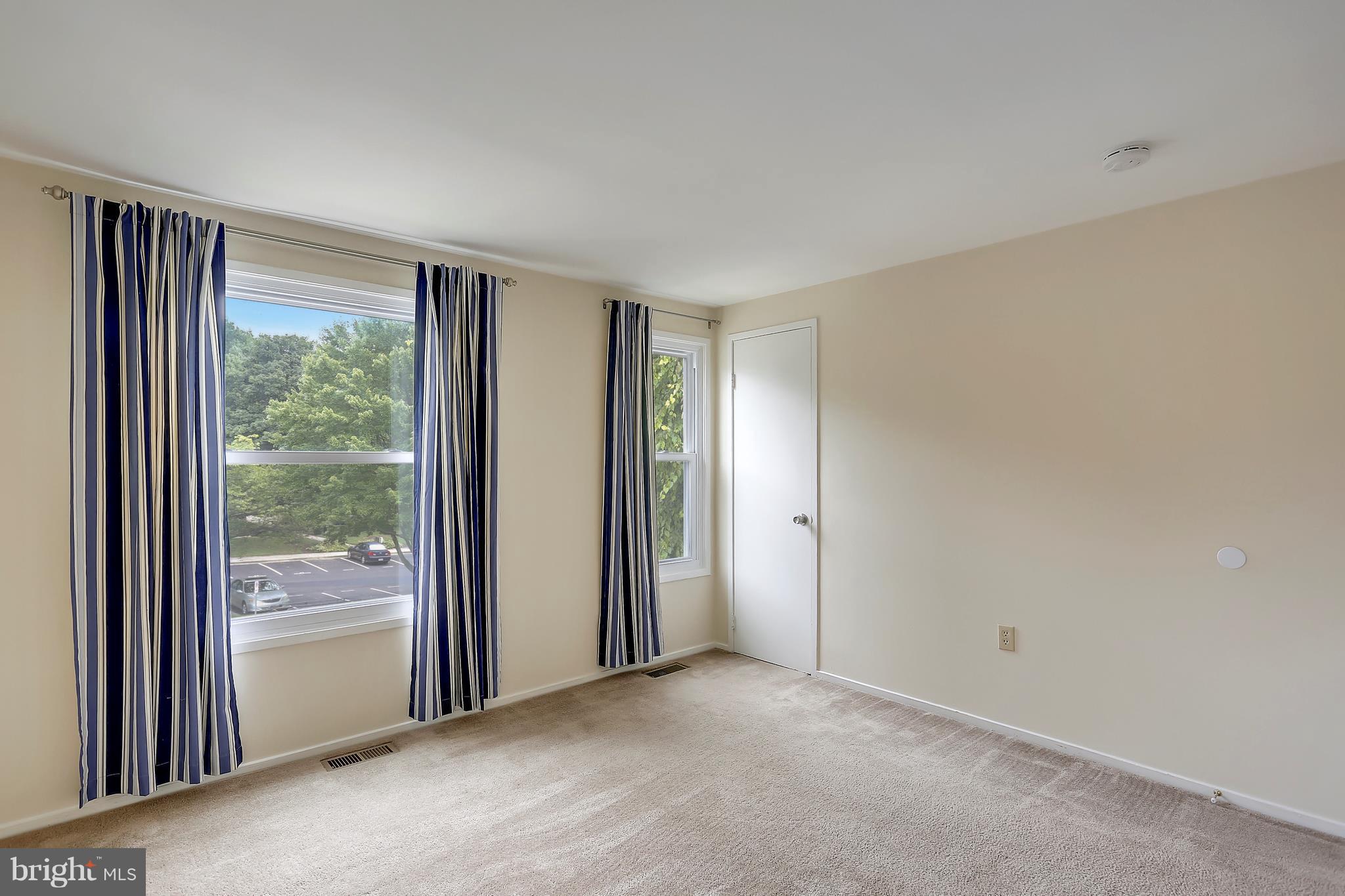 10740 Lester Street Silver Spring, MD 20902 - Photo 18 of 30 a view of a big room with windows and a livingroom