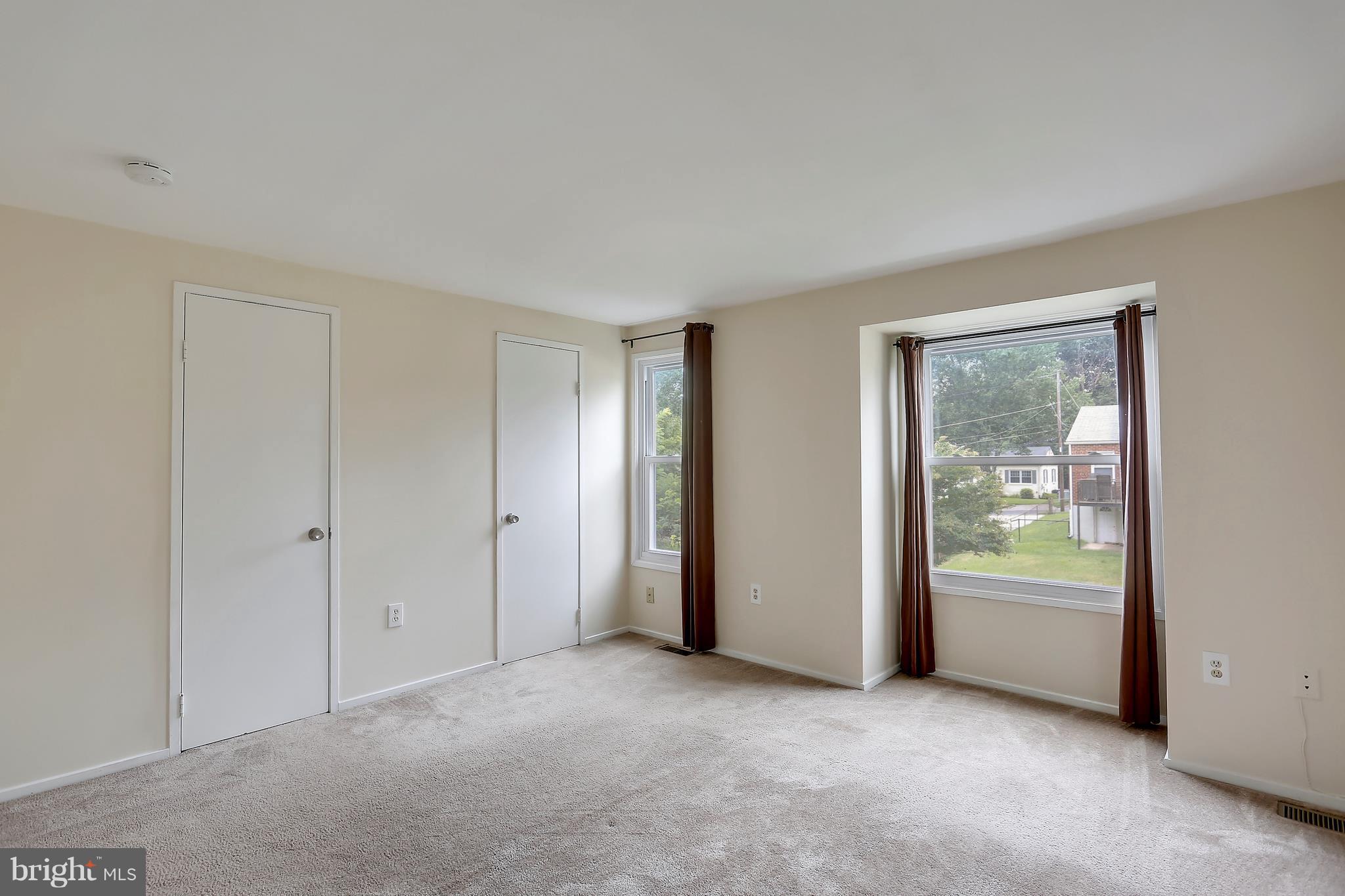 10740 Lester Street Silver Spring, MD 20902 - Photo 21 of 30 a view of an empty room with a window