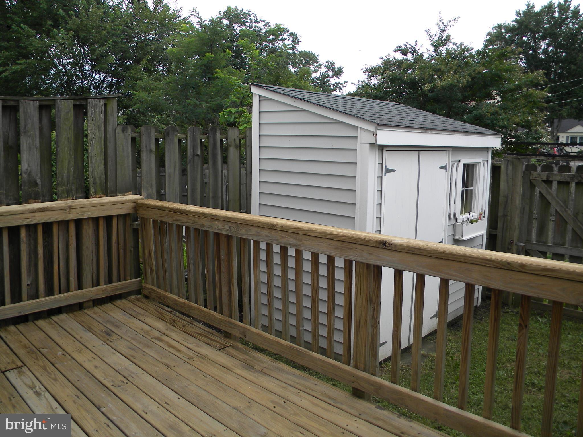 10740 Lester Street Silver Spring, MD 20902 - Photo 24 of 30 a view of wooden balcony