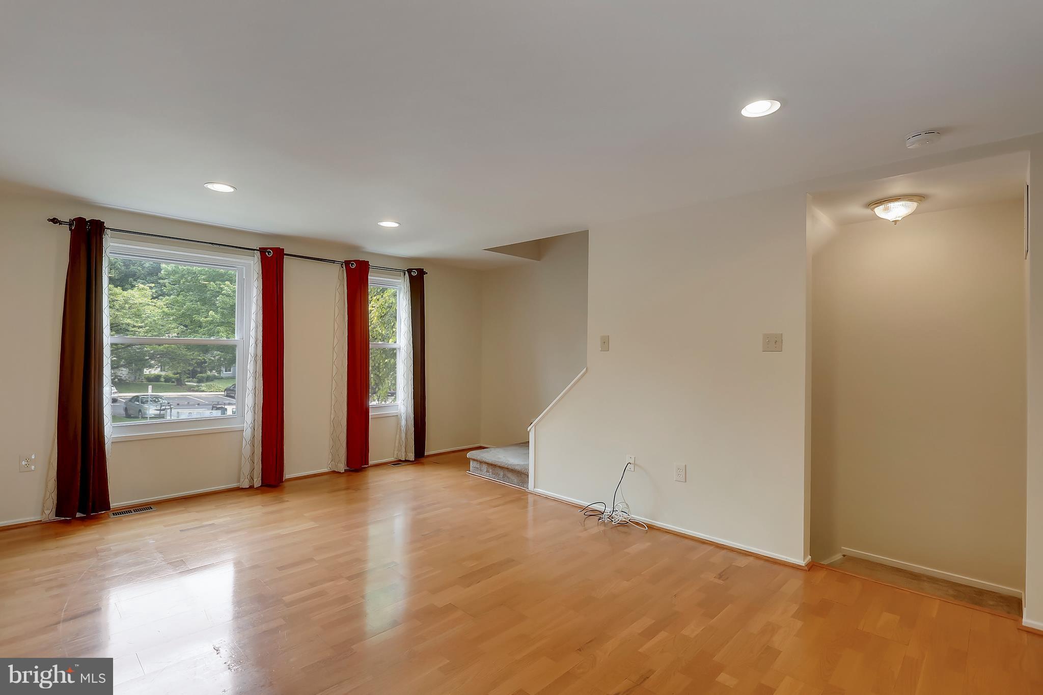 10740 Lester Street Silver Spring, MD 20902 - Photo 9 of 30 a view of an empty room with a window