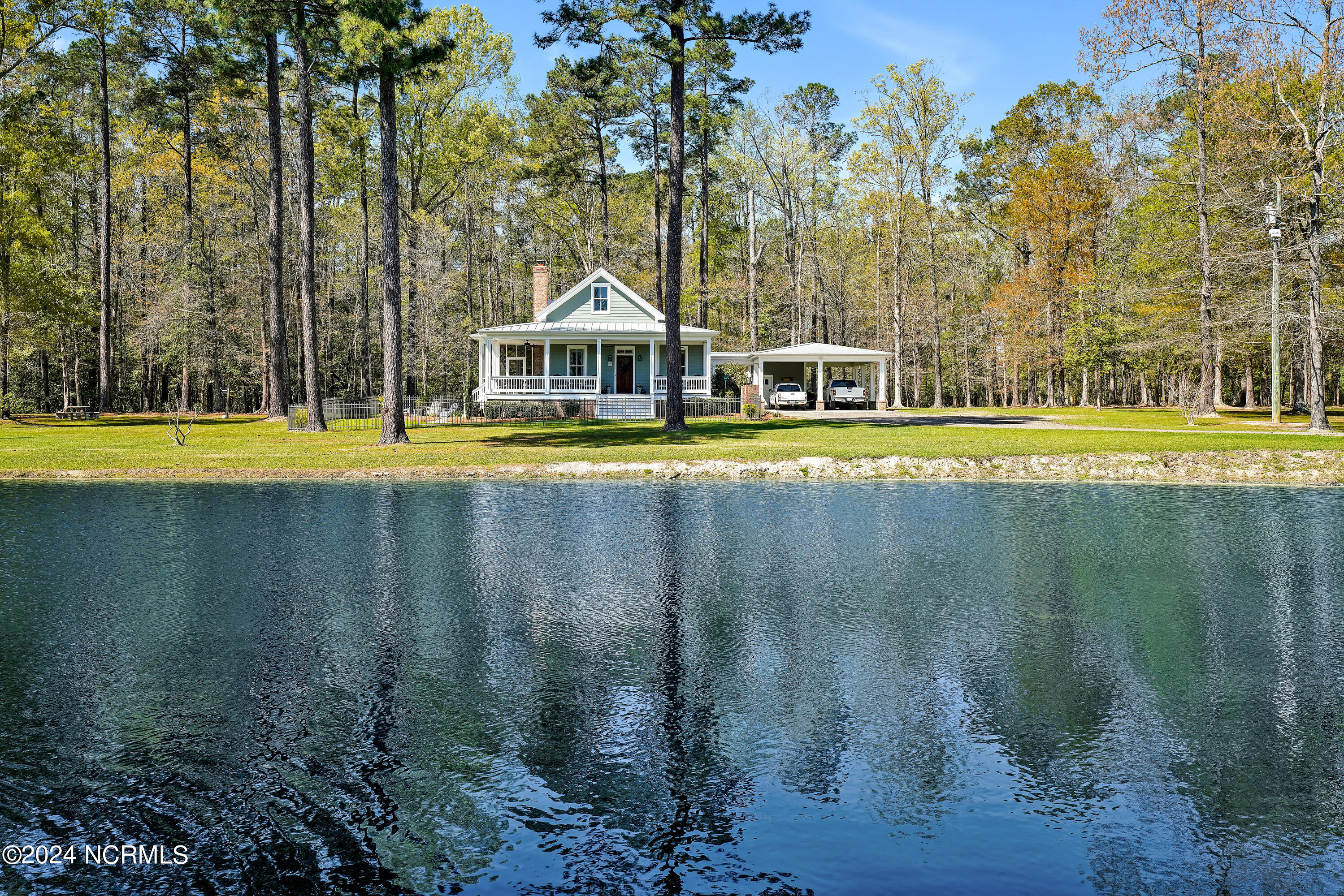97 Justice-Flynn Road Riegelwood, NC 28456 - Photo 5 of 64 Enjoy views of the 3 acre lake from your front porch