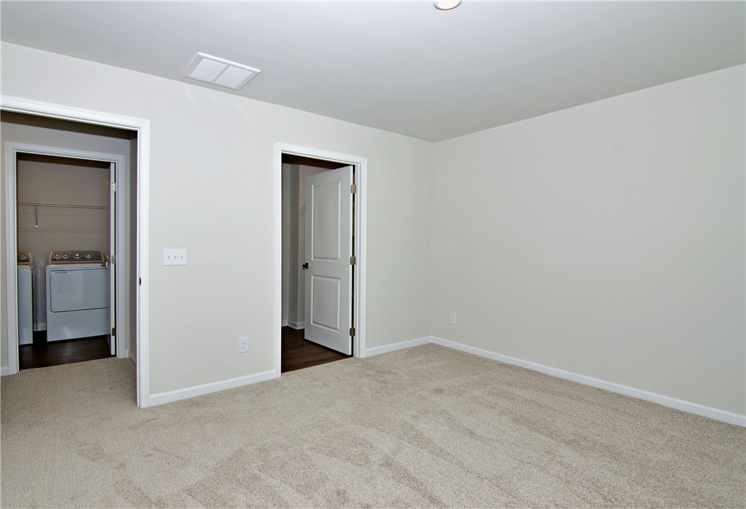 723 Peridot Way Westminster, SC 29693 - Photo 22 of 45 An inviting room features plush carpet flooring, offering a comfortable and versatile living space.