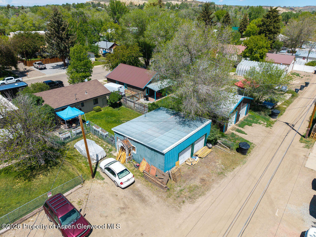 625 Russell Street Craig, CO 81625 - Photo 1 of 35 an aerial view of multiple houses with yard