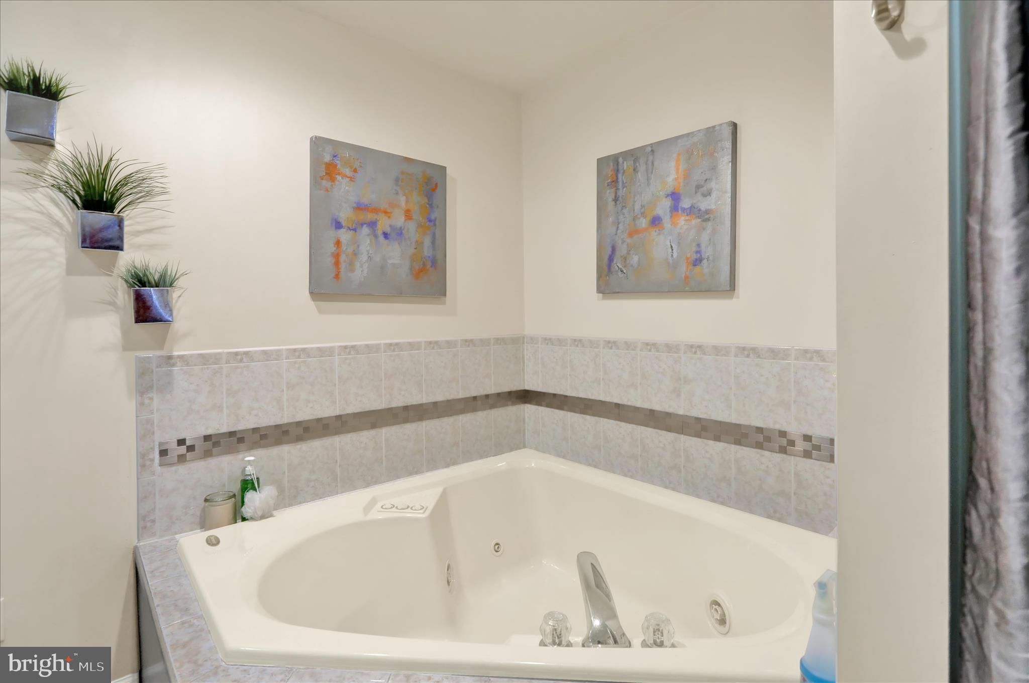 73 Michigan Drive Reading, PA 19608 - Photo 12 of 42 a white bath tub sitting in a bathroom